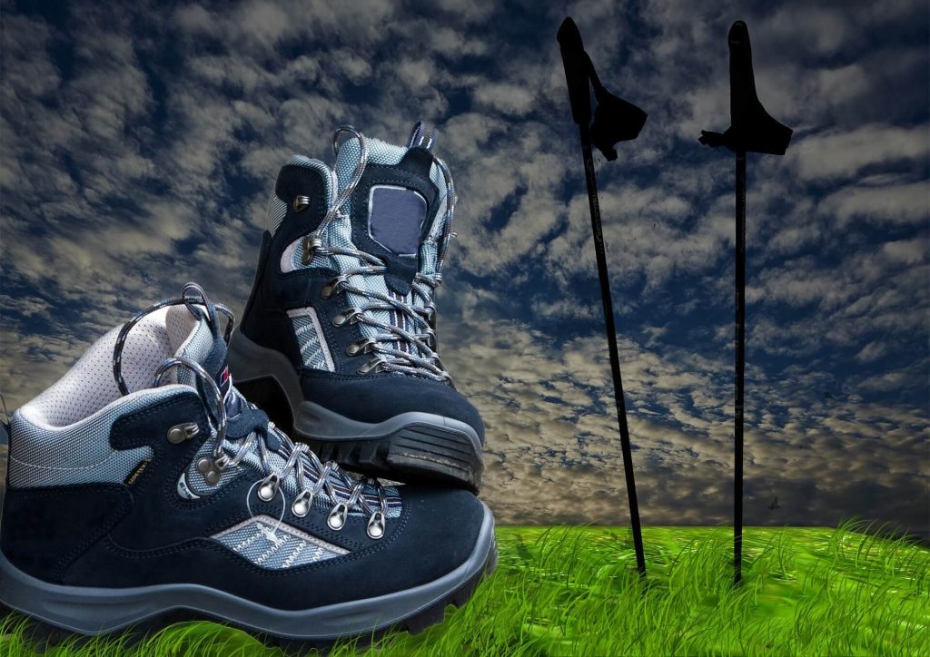 Comfortable walking boots and trekking poles for pain-free joint movement